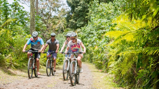 Tourists on a cycling tour in Rarotonga.