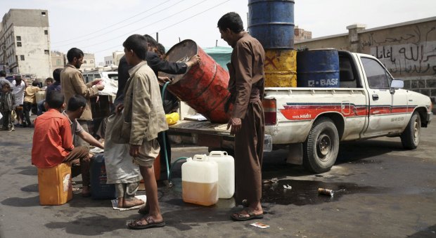 Selling black market fuel during an acute shortage in Sanaa earlier this month. 