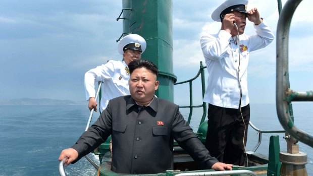Nuclear ambitions ... This undated picture released by North Korea's official new agency in 2014 claims to show leader Kim Jong-Un inspecting a submarine.