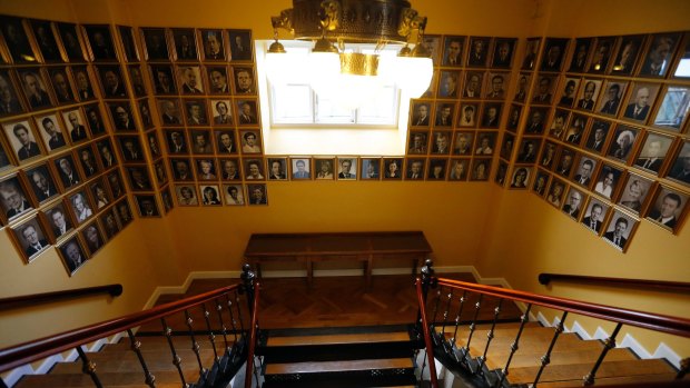 Will there be Pirates in the house? View of the staircase in the Icelandic Parliament with pictures of former prime ministers and ministers.