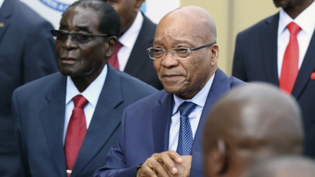 Zimbabwean President Robert Mugabe, left, and South African President Jacob Zuma attend the SASC summit of the Southern African Development Community. 
