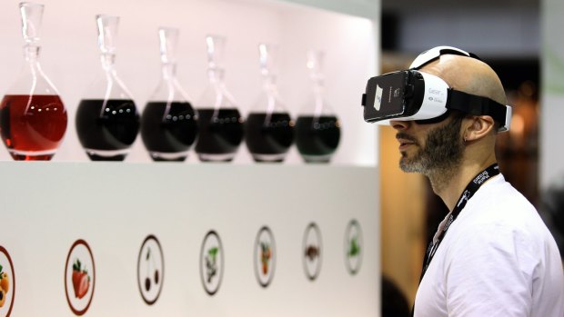 A man wears a virtual reality head-mounted display, at the international wine fair Vinexpo in Bordeaux last week.