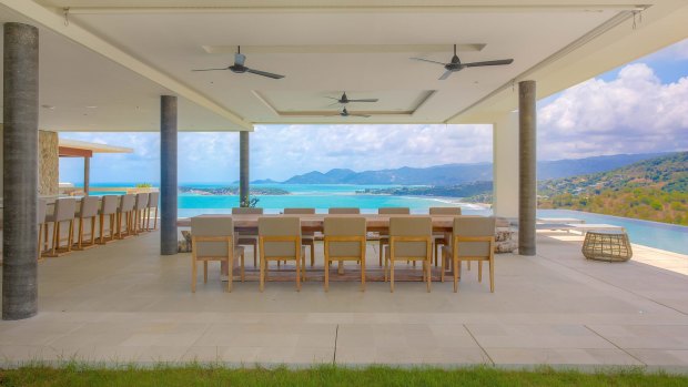 Samujana Villas  sit high on a hill overlooking a coral cove and private beach.