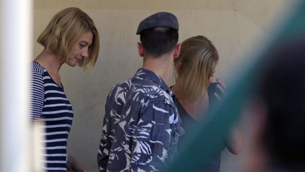 Tara Brown, left, and Sally Faulkner leave a women's prison in Beirut.