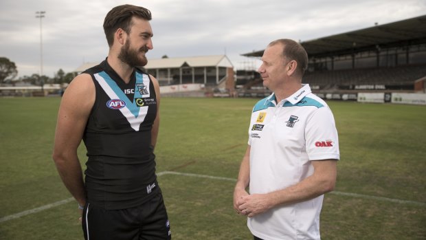 Charlie Dixon with Port Adelaide coach Ken Hinkley.