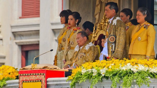Thailand's King Bhumibol Adulyadej is surrounded by his daughters on his 85th birthday.