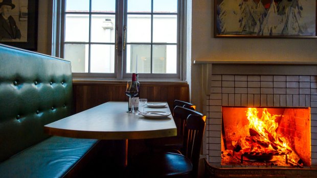Fireplace at Bar Rochford. Photo: Sitthixay Ditthavong