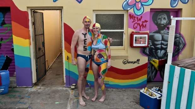Club Captain Danny Adams and Holly Love at Tamaramma SLSC during the Yes to Same-Sex Marriage walk from Bondi to Bronte.
