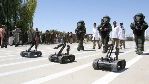 Afghanistan's National Army explosive disposal personnel in a parade in Lashkar Gah, Helmand, earlier this month. 