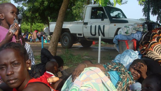 At least 3000 displaced women, men and children gather to seek shelter in Juba, South Sudan at a UN compound.