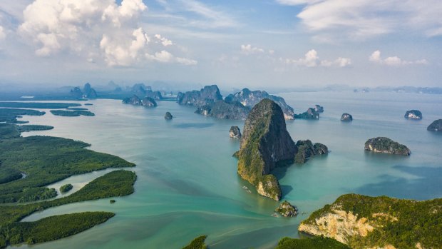 Phuket is your springboard to Phang Nga Bay where limestone islands rise like sleeping sea monsters.