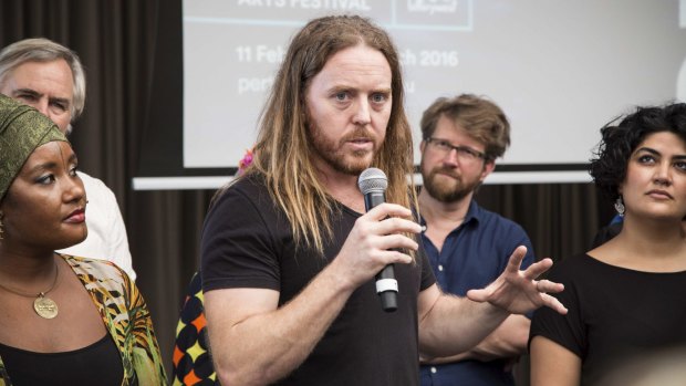 Tim Minchin is proud of being Australian but said "we're arseholes as well".