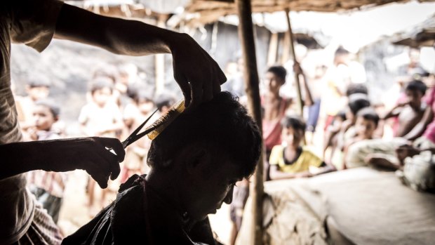 A Rohingya barber at the Kutupalong Refugee Camp in Teknaaf, Bangladesh.