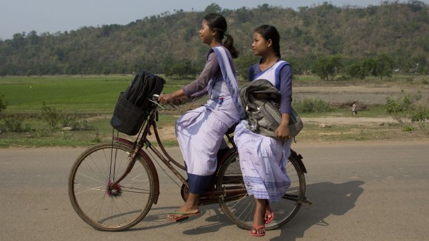 Girls go to school at Roja Mayong village about 40 kilometres east of Gauhati, India.