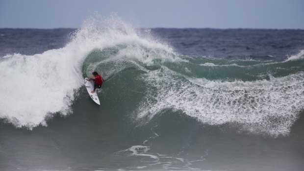 Carve-up: Conner Coffin drives through the open face of a wave during his round two heat.