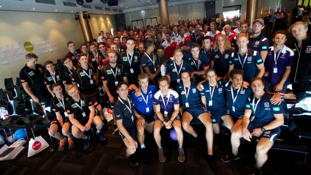 Players gather at the end of the AFL/AFLPA draftee induction camp at Etihad Stadium.

