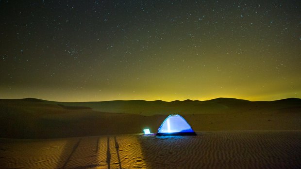 A tent sits in the sand of the Al Ain southern desert overnight, just outside of Abu Dhabi. 