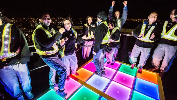 On top of the Bridge, revellers dance on the opening night of Vivid.