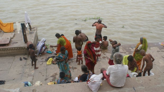 Devout Hindus get ready to take dip in the Ganges at Varanasi.