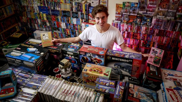Sam Crowther and his Nintendo video games collection.