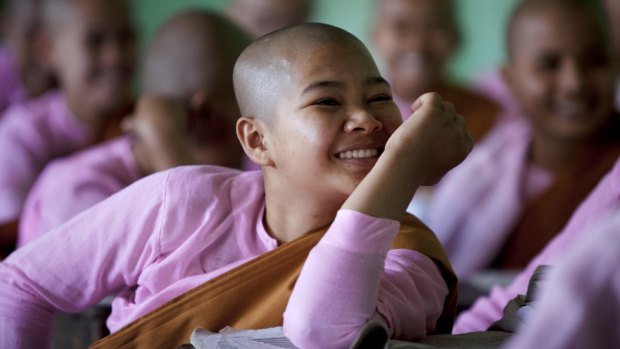 Myanmar's top score is likely to be a result of the practice Theravada Buddhism by a large proportion of the population. Pictured, a class of young buddhist nuns at Kalaywa Monastery, Yangon.