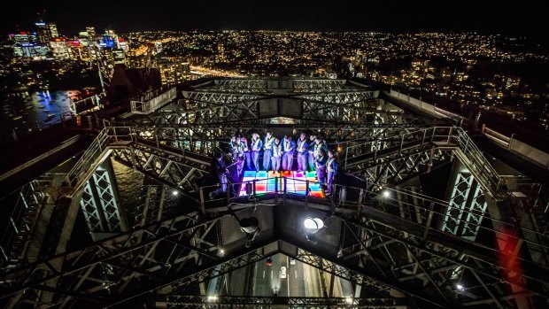 A 1970s-style disco dance floor sits at the top of the Sydney Harbour Bridge for Vivid 2016. 
