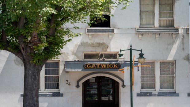 The man fell from the third storey of the Gatwick Hotel in St Kilda.