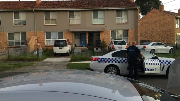 Police seen leaving Habib Ali's Perth Street home on Tuesday evening. 