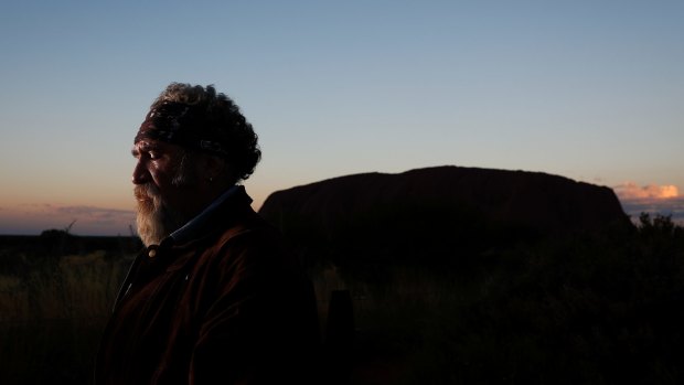 Sam Backo, a former professional rugby league player and son of former chairwoman of the Council for Aboriginal Reconciliation, Evelyn Scott, at Uluru.