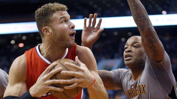 Crucial cog: Los Angeles Clippers' forward Blake Griffin drives to the basket against Phoenix Suns opponent P.J. Tucker.