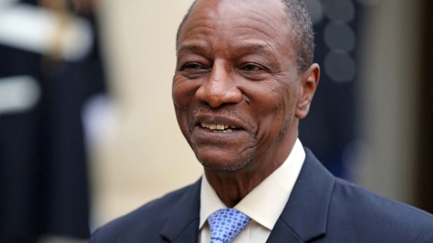 BSGR claims George Soros, when advising Guinean President Alpha Condé (pictured), was instrumental in the decision to strip the company of its mining licences in 2014. 