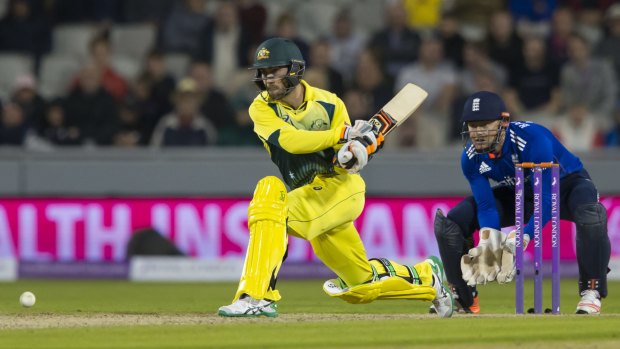 Hit and miss: Glenn Maxwell pulls out a reverse sweep. Australia coach Darren Lehmann has no issues with him playing the shot.