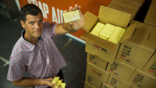 Michael Matulick from Melbourne-based not-for-profit group Soap Aid, with soap made from recycled hotel soap.