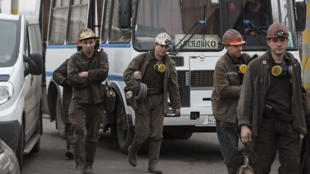 Miners arrive to help with the rescue effort in the Zasyadko coal mine.