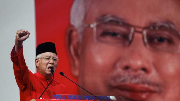  Malaysian Prime Minister Najib Razak addresses delegates during his speech at the United Malays National Organisation's (UMNO) anniversary celebration in Kuala Lumpur in May