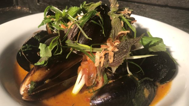 Fumo's sake steamed mussels with kimchi butter and shiso leaf.