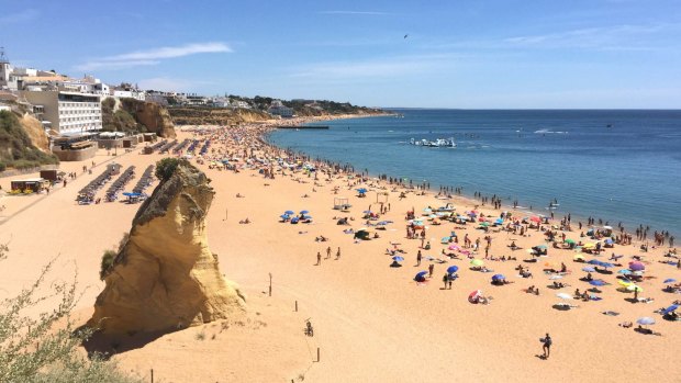 Soak up the sun in one of the many coastal cities in the Algarve region of Portugal.