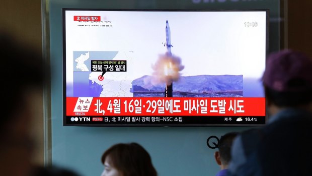 A television screen at Seoul Station on Sunday shows a news broadcast on North Korea's ballistic missile launch.