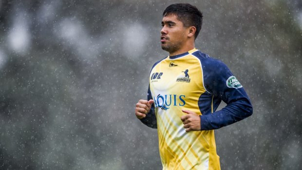 Jarrad Butler trains in the rain with the Brumbies on Monday.