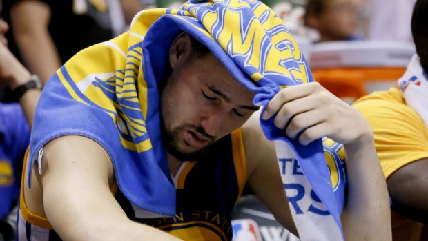 Painful to watch: Golden State Warriors guard Klay Thompson reacts in the final moments against the Oklahoma City Thunder in Game 4 of the NBA Western Conference finals in Oklahoma City.