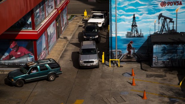 Fuel crisis: Vehicles wait in line for fuel at a petrol station in Caracas, Venezuela.