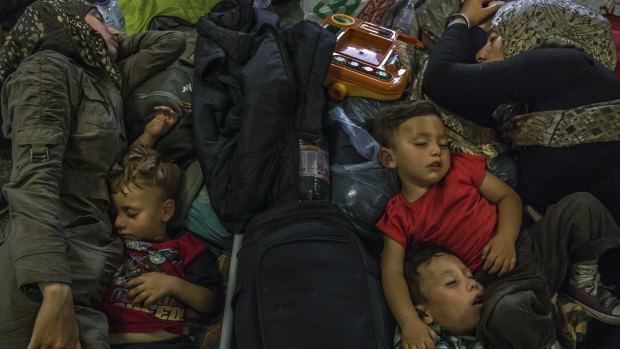 Refugees sleep underneath the Keleti train station in Budapest.