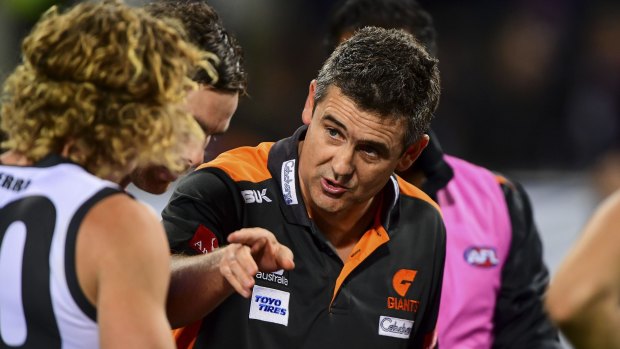 Leon Cameron offers some words of wisdom to his charges at the final break.