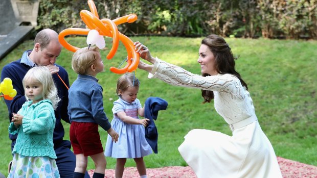 The Duchess of Cambridge entertains Prince George with a spider balloon at a children's party for Military families during the Royal Tour of Canada on September 29, 2016 in Victoria, Canada.