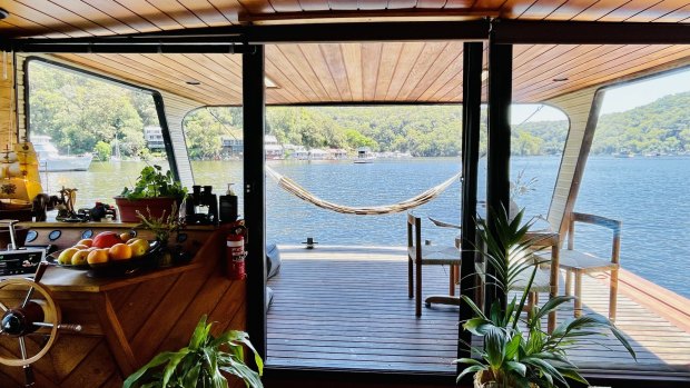 Oh Buoy, a 1970s houseboat, restored from its dilapidated state by hand.