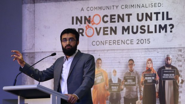 Hizb ut-Tahrir spokesman Uthman Badar delivers a speech during the conference "A Community Criminalised: Innocent Until Proven Muslim" in Sydney.