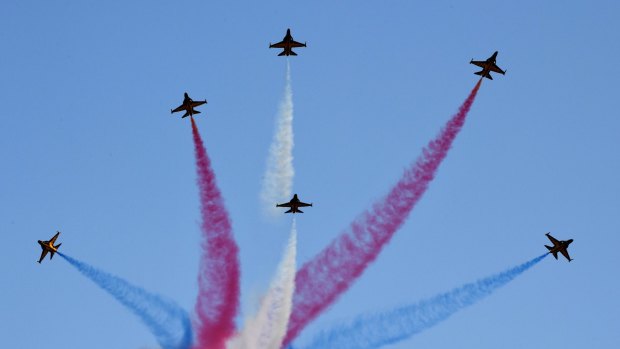 South Korean Air Force Black Eagles aerobatic team perform during a commemoration ceremony on Thursday.