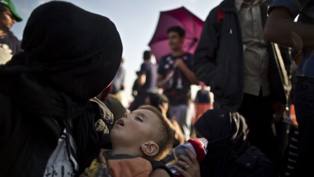 Syrians waiting near Roszke, southern Hungary, last Sunday.