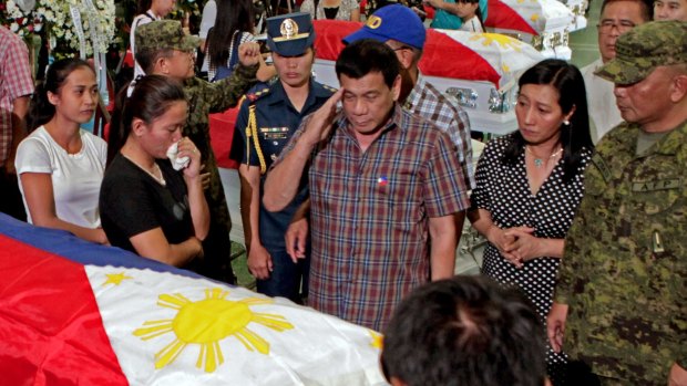 August 2016: Philippine President Rodrigo Duterte salutes the coffins of 15 soldiers killed in a gunbattle with Abu Sayyaf militants in Mindanao.