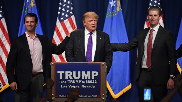 Donald Trump has said he is turning over control of his business to his two adult sons Donald Trump Jr (left) and Eric Trump (right). 